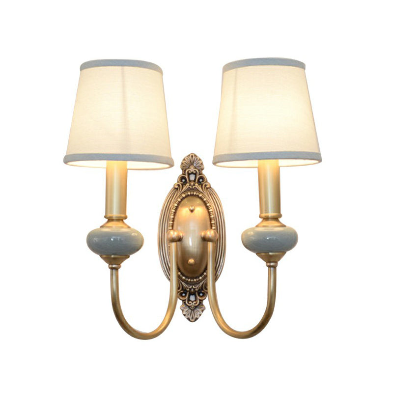 Wandleuchte Clémence Brass Swoop Arm