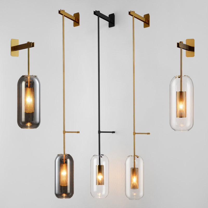 Elodie Capsule Wall Lamp with Clear Glass and Black/Gold Frame