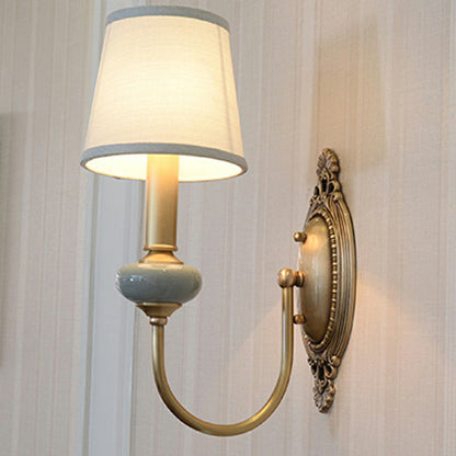 Wandleuchte Clémence Brass Swoop Arm
