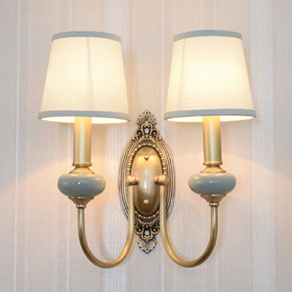 Wandleuchte Clémence Brass Swoop Arm