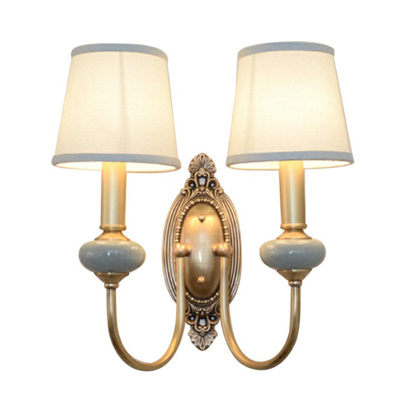 Wandleuchte Clémence Brass Swoop Arm
