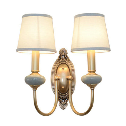 Wandleuchte Clémence Brass Swoop Arm