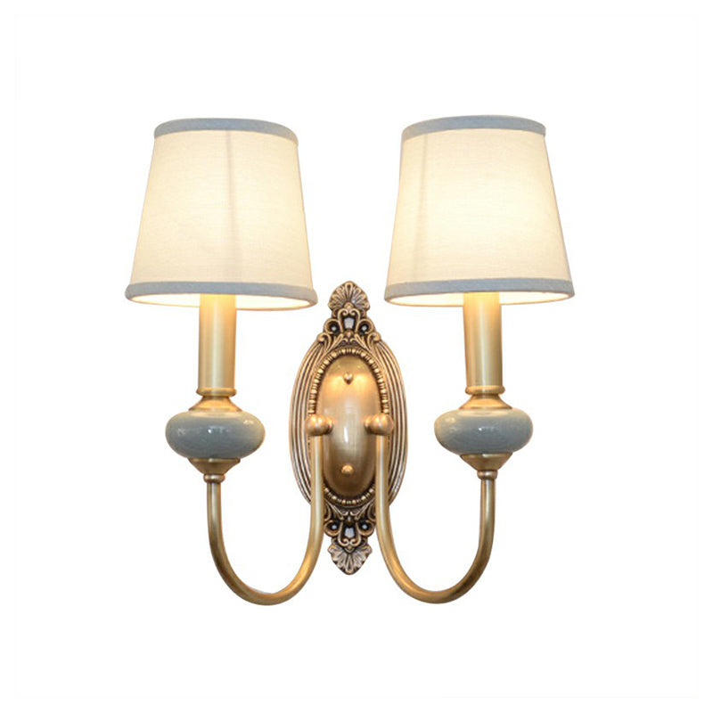 Wandleuchte Clémence Brass Swoop Arm