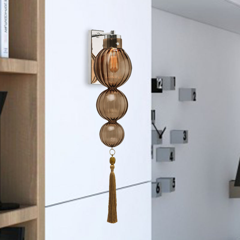 Vivienne Kugelwandleuchte mit Glasschirm und Quastenknoten