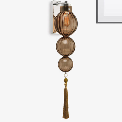 Vivienne Kugelwandleuchte mit Glasschirm und Quastenknoten