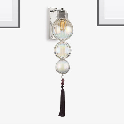Vivienne Kugelwandleuchte mit Glasschirm und Quastenknoten