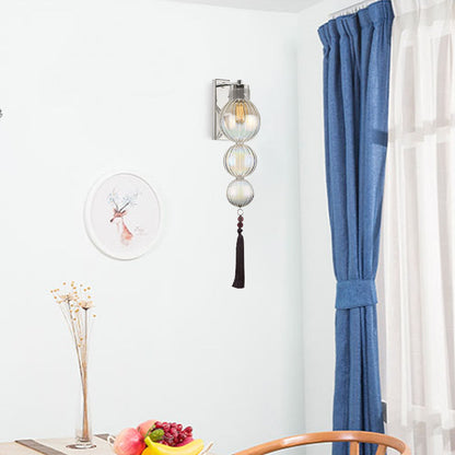Vivienne Kugelwandleuchte mit Glasschirm und Quastenknoten