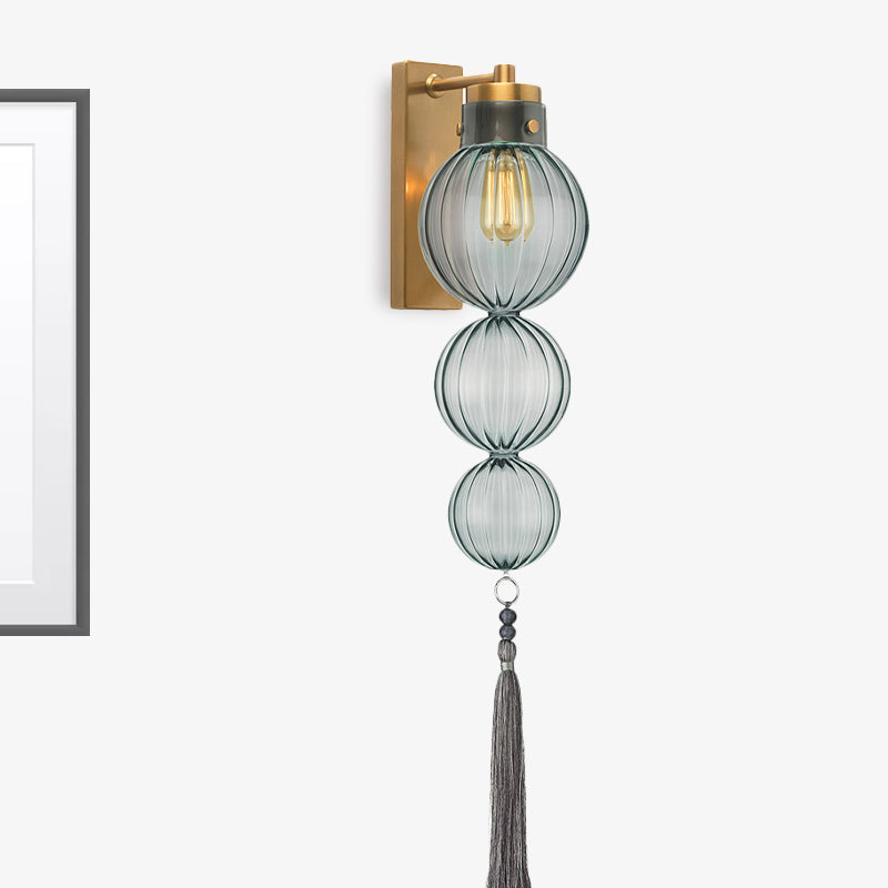 Vivienne Kugelwandleuchte mit Glasschirm und Quastenknoten