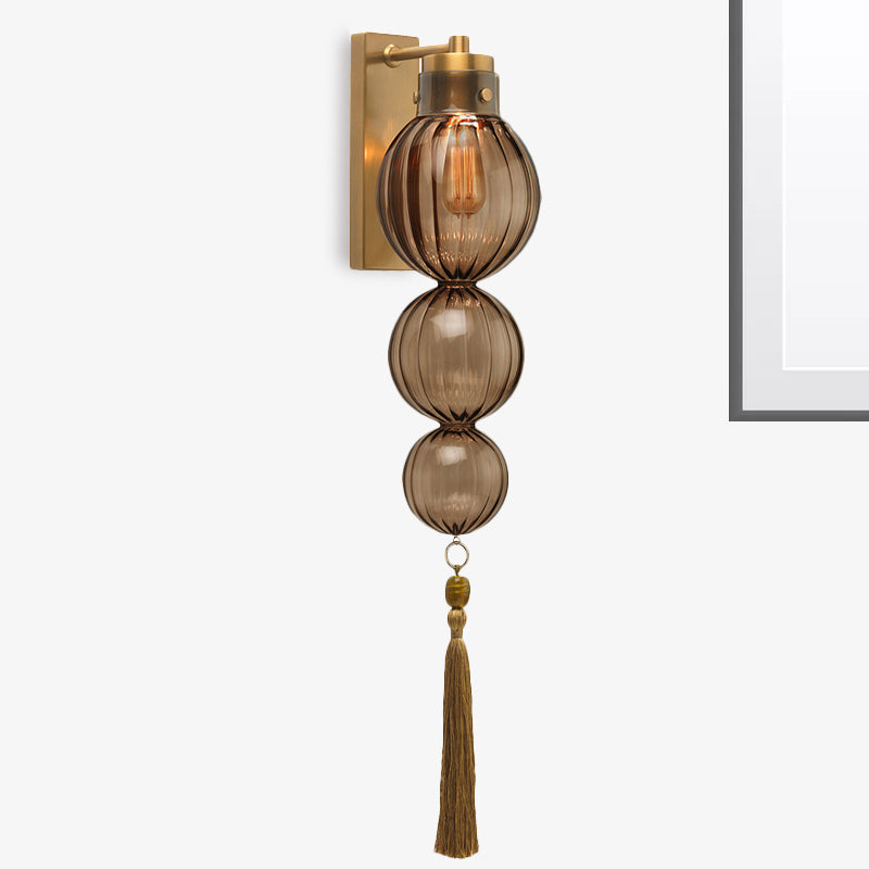 Vivienne Kugelwandleuchte mit Glasschirm und Quastenknoten