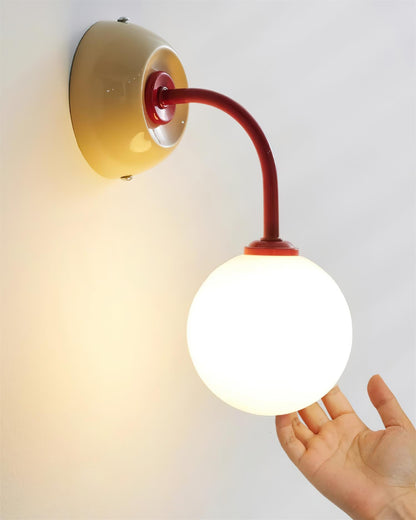 Léonie Retro Globe Wall Lamp with Curved Arm Design