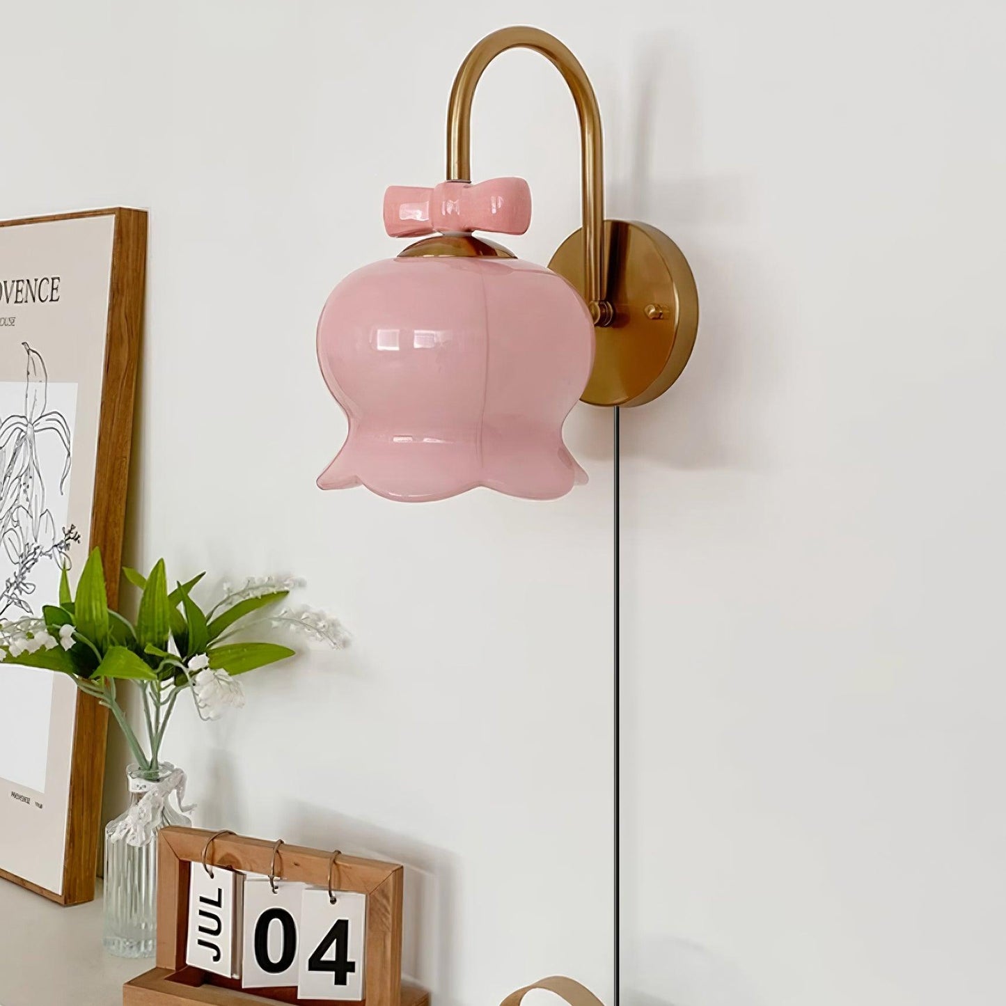 Chloé Bell Wandleuchte mit dekorativem Schleifendesign