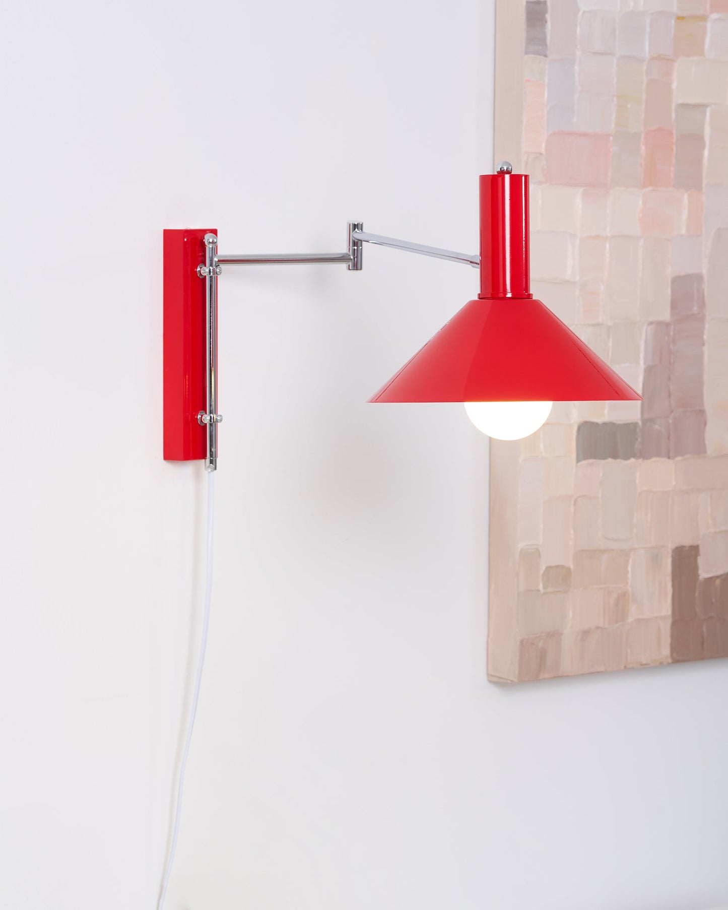 Céline Peak Steckdosenlampe mit verstellbarem Drehgelenk