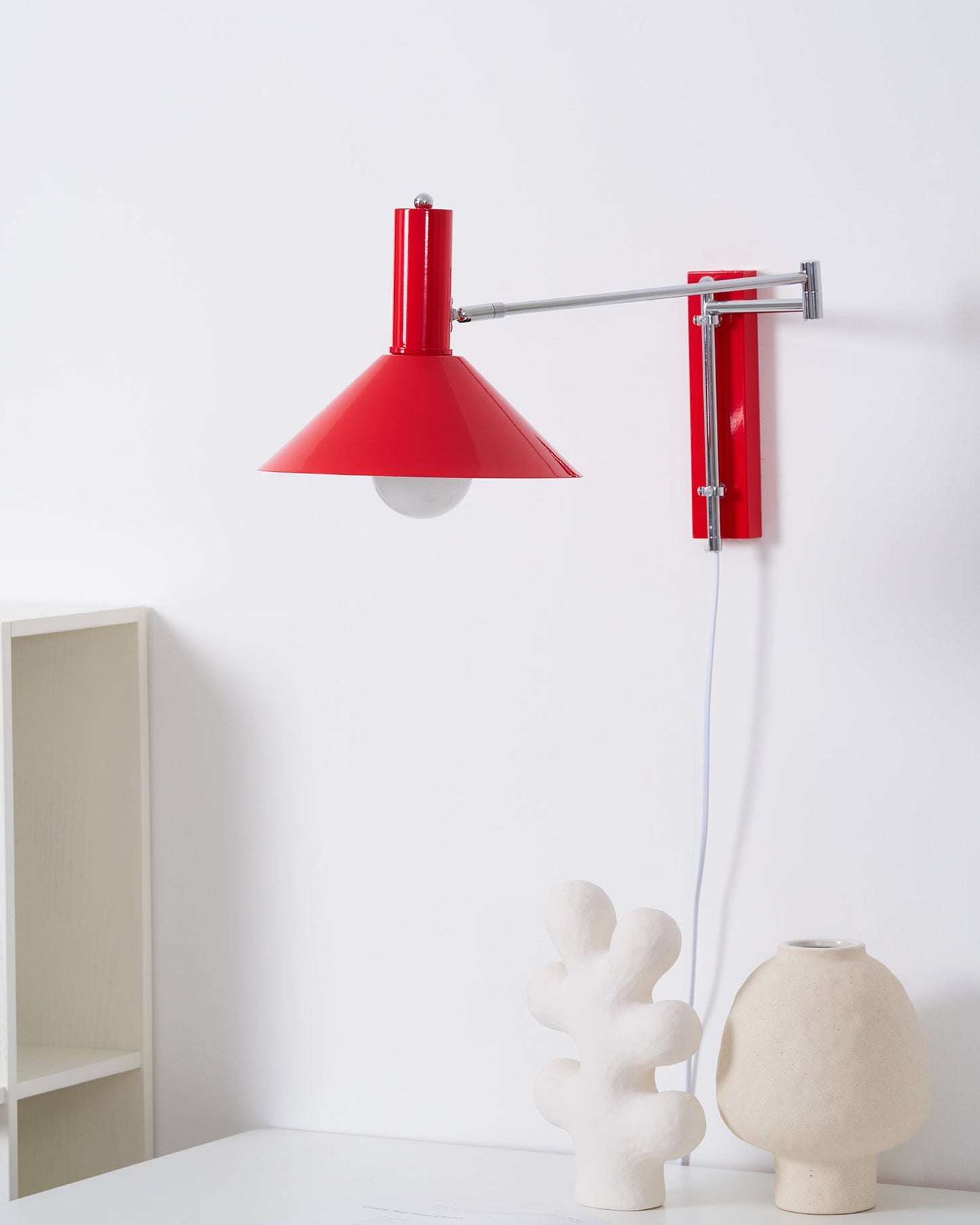 Céline Peak Steckdosenlampe mit verstellbarem Drehgelenk