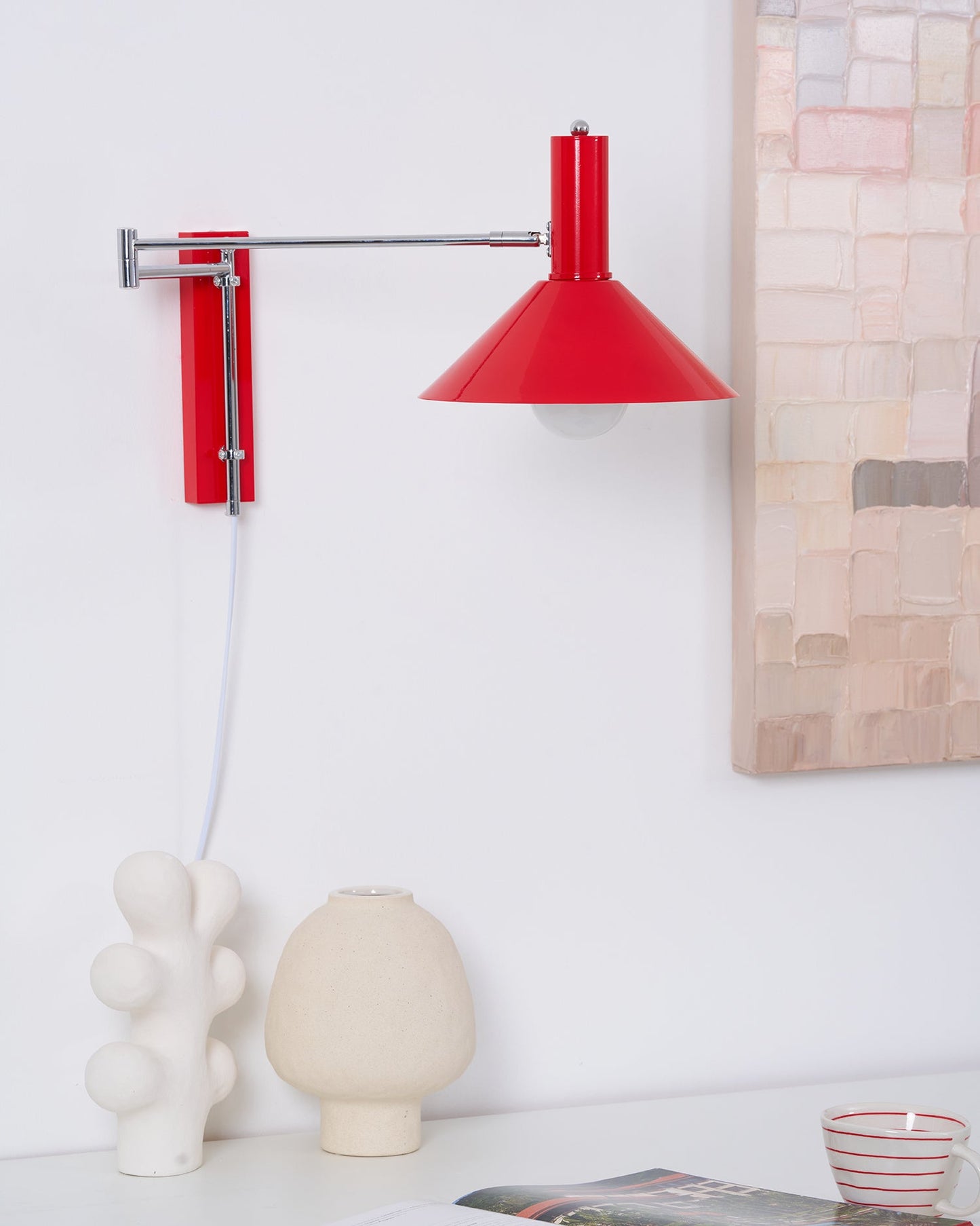 Céline Peak Steckdosenlampe mit verstellbarem Drehgelenk