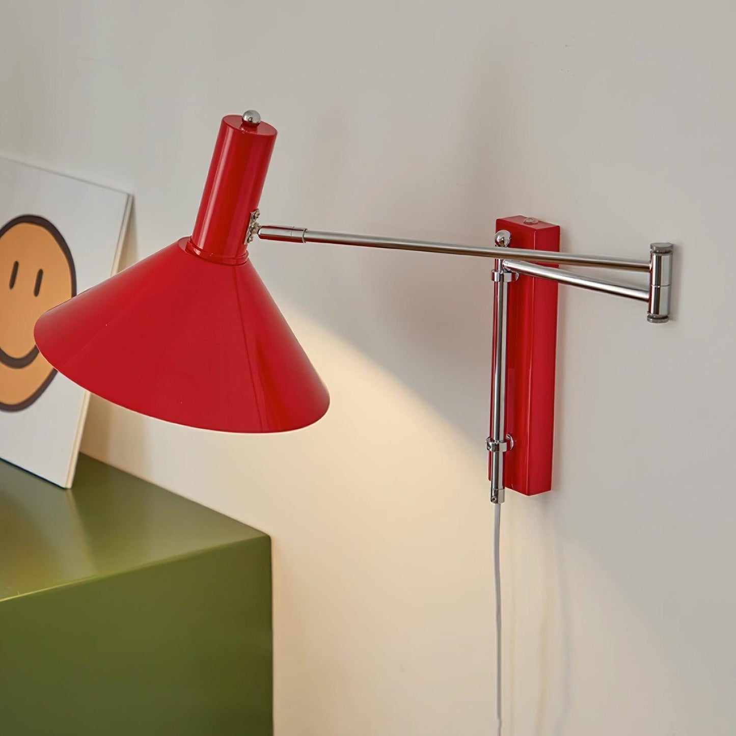 Céline Peak Steckdosenlampe mit verstellbarem Drehgelenk