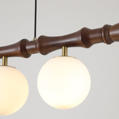 Céline Wood Chandelier, Carved Wooden Beam with Frosted Glass Globes