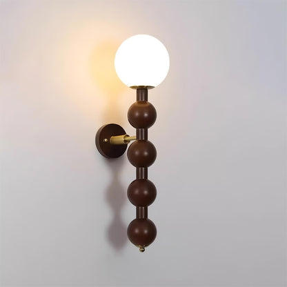 Selene Kugelwandleuchte mit Nussbaum-Perlmuttdesign und warmem Licht